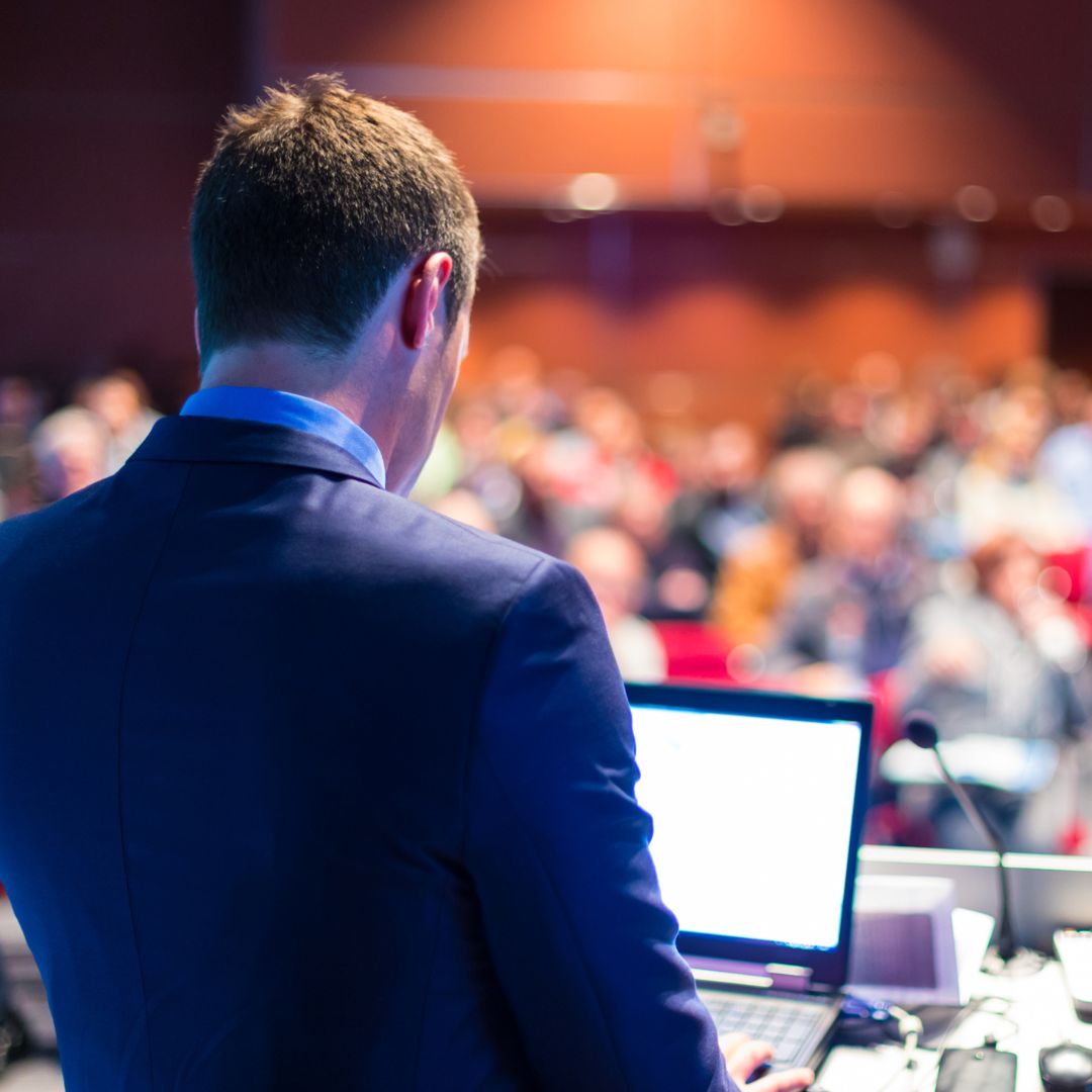 a person talking at an event