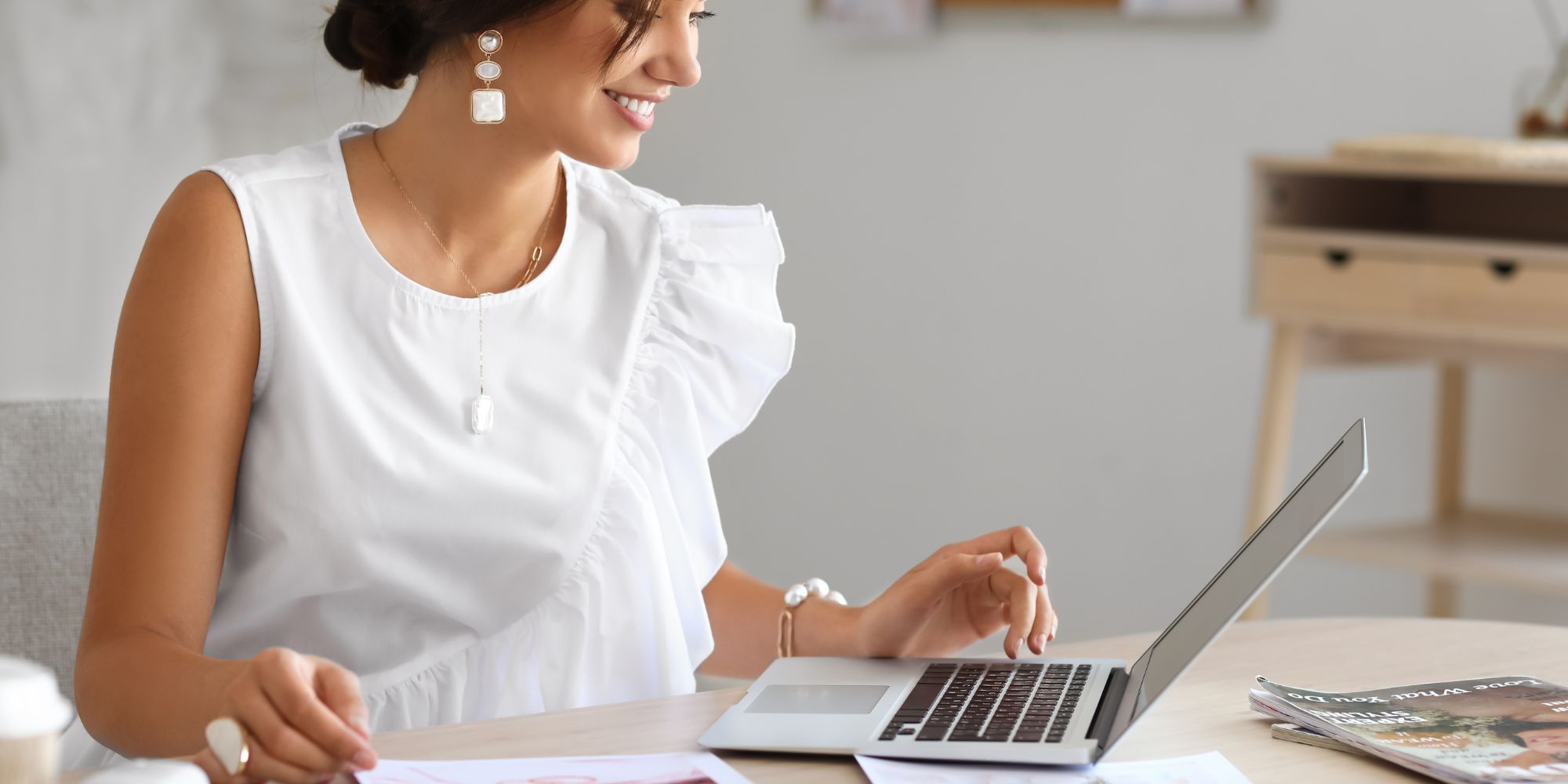 wedding coordinator on laptop