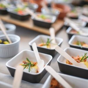 Catering appetizers lined up on a table